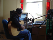 James recording guitar